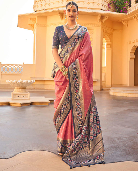 Peach Ikat Patola Designer Saree, Subtly Woven with Ikat Butta, Complemented by a Contrast Ikat Border, Intricate Pallu, and a Contrast Blouse