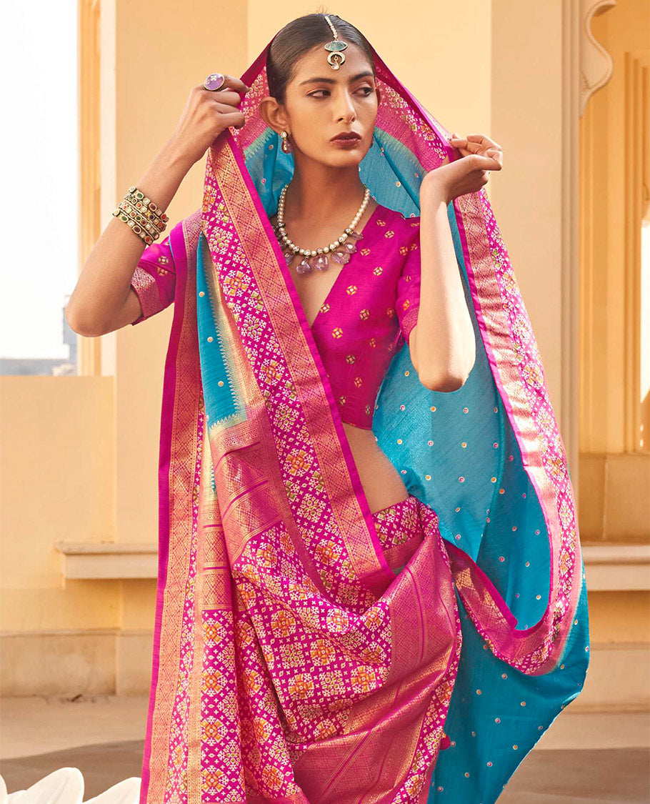 Blue Ikat Patola Designer Saree, Subtly Adorned with Ikat Buttas, Complemented by a Contrast Ikat Border, Intricate Pallu, and a Contrast Blouse