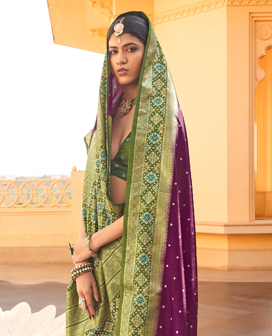 Purple Ikat Patola Designer Saree, Subtly Adorned with Ikat Buttas, Complemented by a Contrast Ikat Border, Intricate Pallu, and a Contrast Blouse