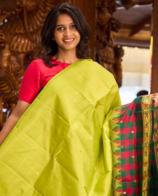 Parrot green zari buttas Kanchipuram silk saree, contrast one-sided checked border of thazampoo rekku, and kamalam designs, and zari design pallu