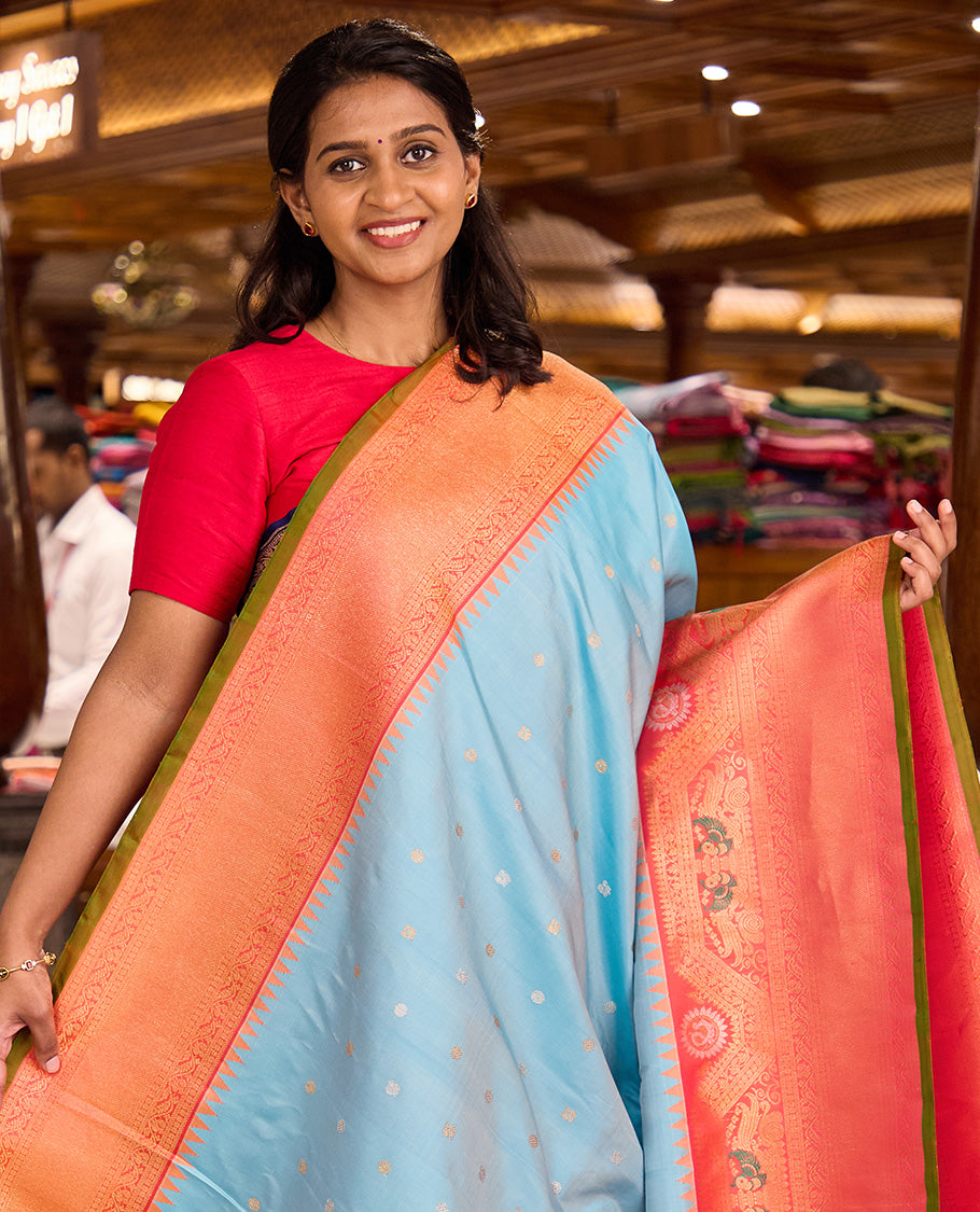 Baby blue mayil chakram buttas gadwal silk saree, contrast border of rekku, mayil, and kodi visiry designs, and intricate pallu