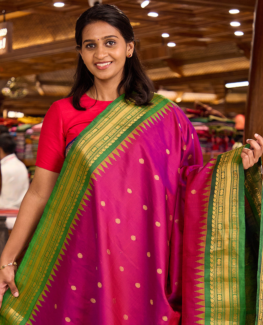 Pink chakram buttas gadwal silk saree, contrast thazampoo rekku border of manga mokku, star kamalam, and vanki designs