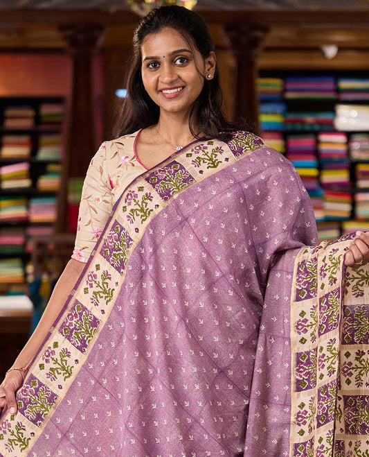 Lavender floral motifs hand block printed Muga silk saree, contrast Patola floral block printed border, and pallu of mango and stripes block print