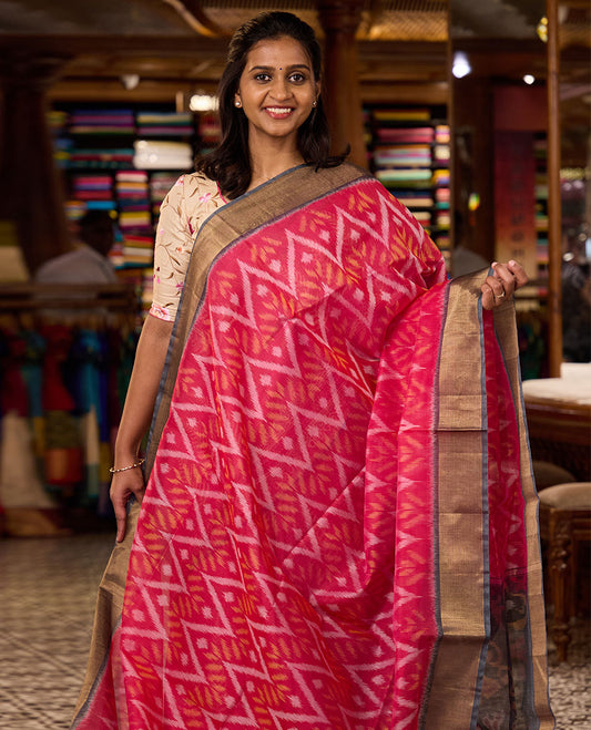 Pink Pochampally Ikkat-style chevron design silk cotton saree, contrast bavanji zari border, and ikkat design pallu