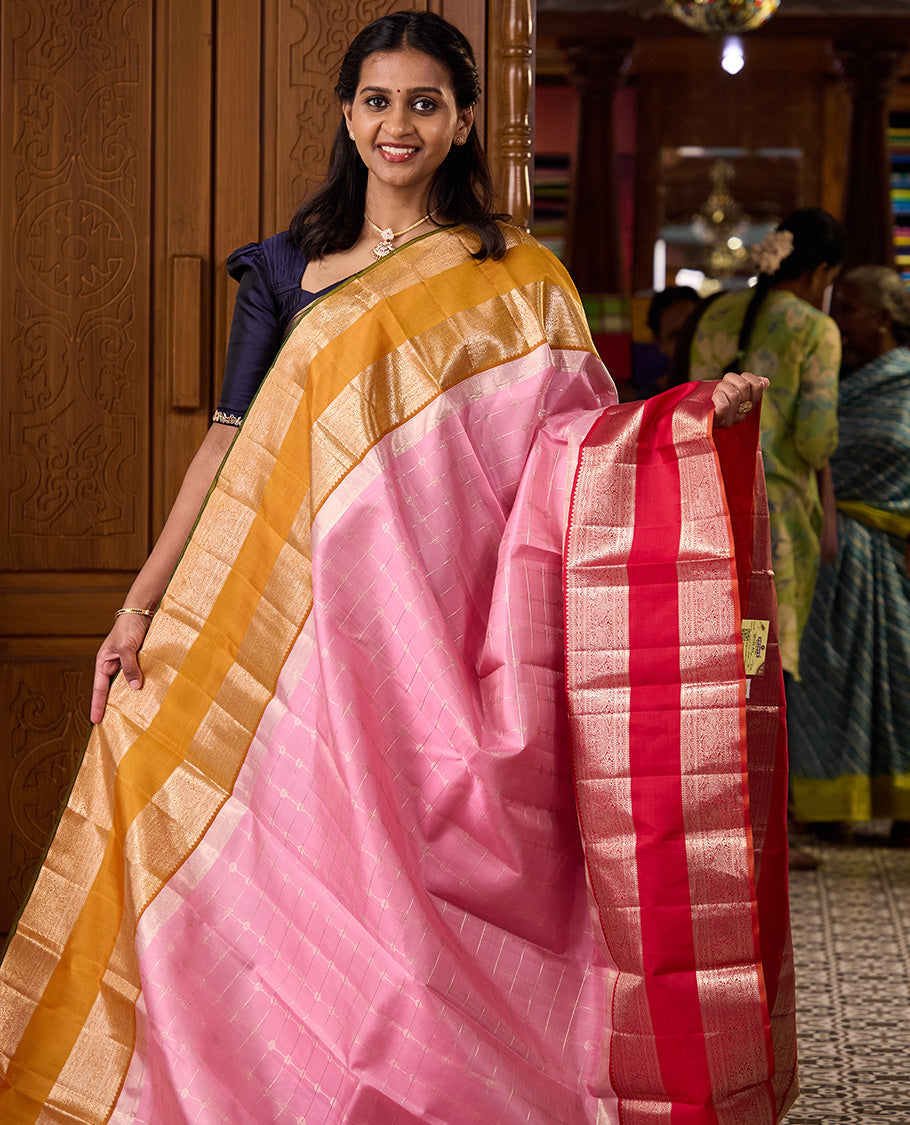 Pink zari checked Kanchipuram silk saree, contrast rettai pettu ganga jamuna border of thilakam and mayil designs, and zari woven pallu