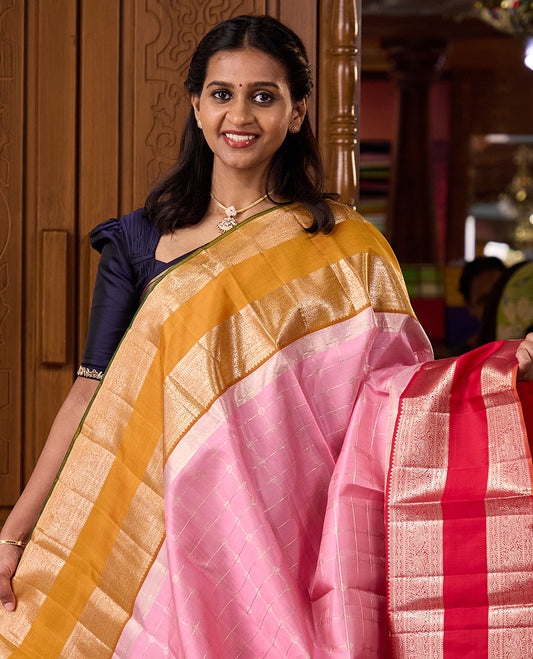 Pink zari checked Kanchipuram silk saree, contrast rettai pettu ganga jamuna border of thilakam and mayil designs, and zari woven pallu