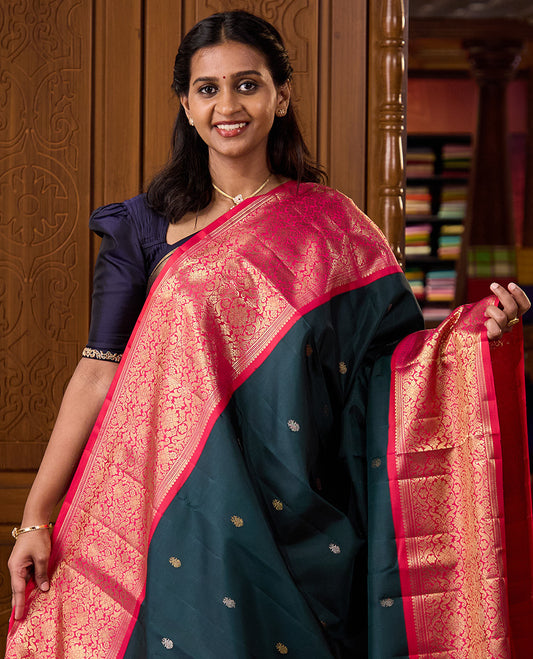 Green zari buttas Kanchipuram silk saree, contrast Mugal style intricately zari woven border, and pallu