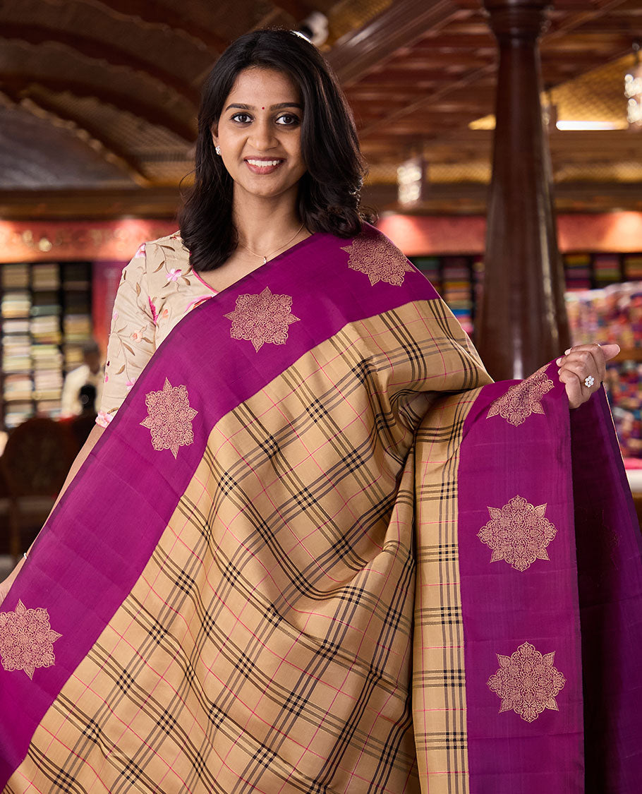 Dark sandal burberry-style checked Kanchipuram silk saree, contrast kolam motifs, zari border, and zari design pallu