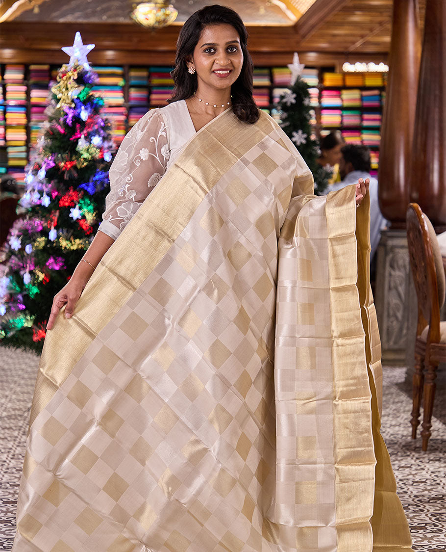 Pearl white base golden and silver zari checked silk saree, getti zari bavanji border, and zari woven pallu