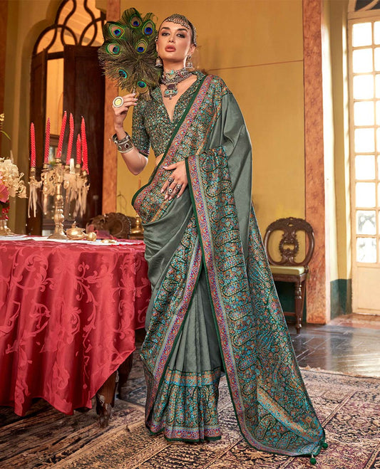 Green plain designer catalog saree, meenakari Mugla style floral and paisleys featured border and pallu