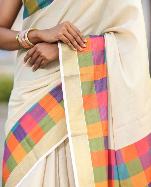 Gold Plain Kerala Tissue Cotton Saree, a Contrast Medium-Size Multi-Color Checked Border, Checked Pallu, and a Contrast Blouse