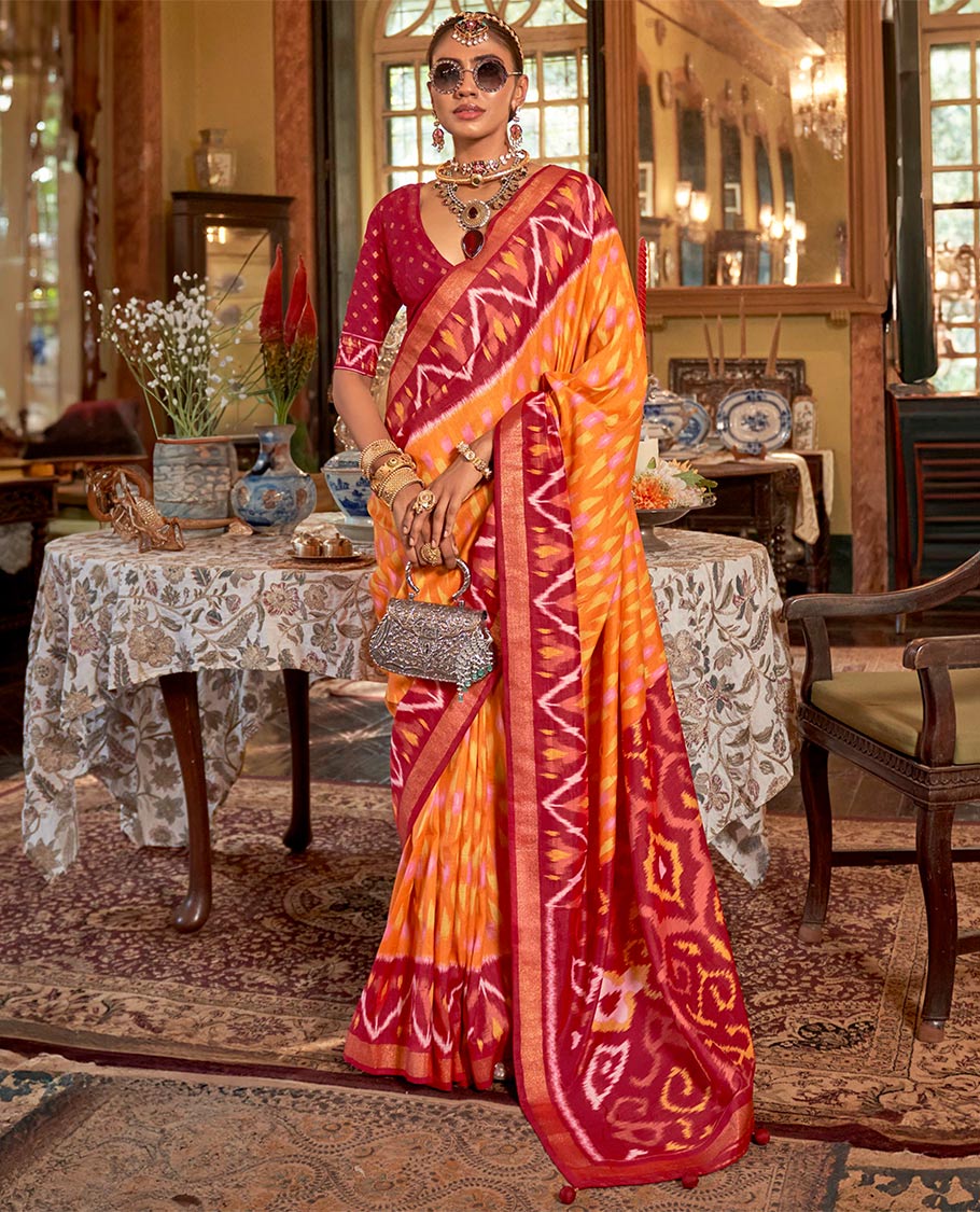 Orange ikkat buttas designer catalog saree, contrast chevron ikkat patterned border, pallu of ikkat design