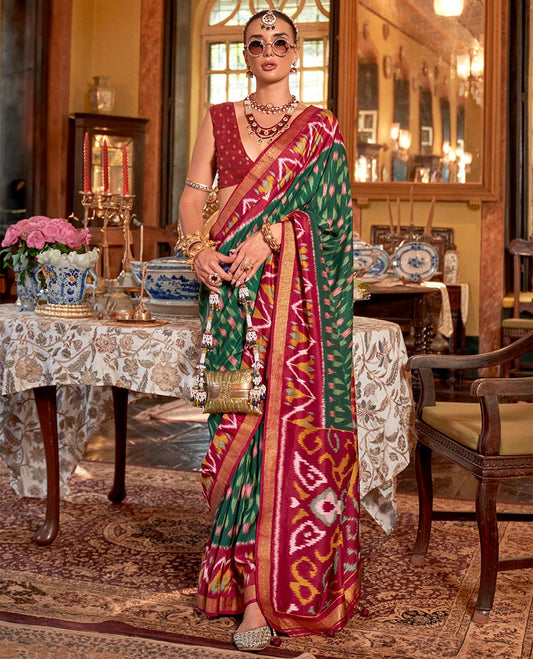 Green ikkat buttas designer catalog saree, contrast chevron ikkat patterned border, pallu of ikkat design