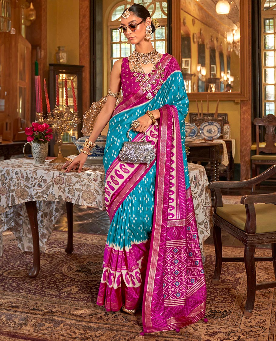 Sky blue diamond buttas patola designer catalog saree, contrast ikkat geometric and paisleys border and pallu of ikkat jaal design