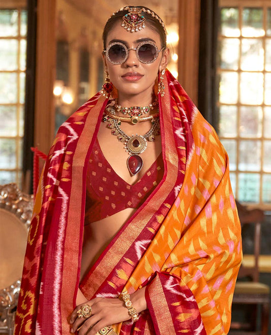 Orange ikkat buttas designer catalog saree, contrast chevron ikkat patterned border, pallu of ikkat design
