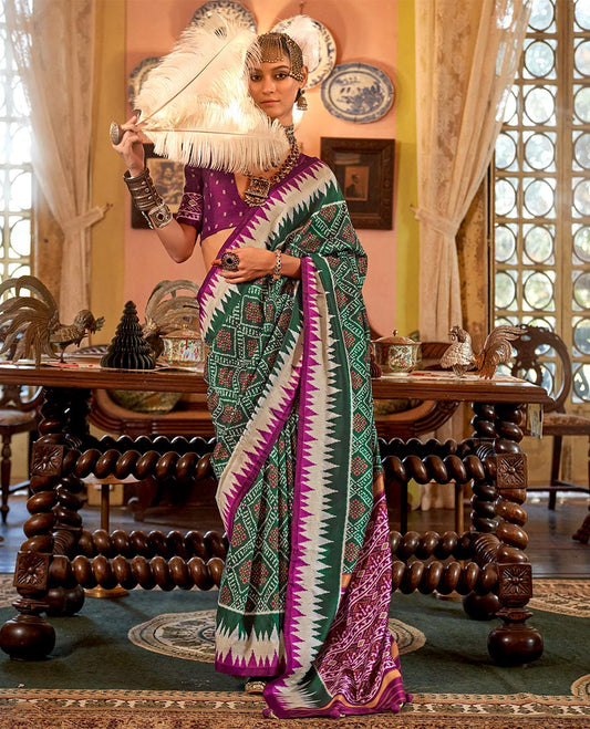 Green diamond patterned patola designer catalog saree, contrast temple border, and patola design pallu