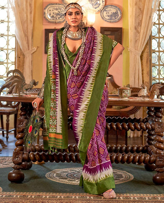 Purple diamond patterned patola designer catalog saree, contrast temple border, and patola design pallu