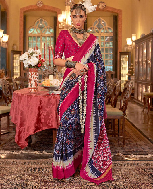 Ink blue diamond patterned patola designer catalog saree, contrast temple border, and patola design pallu
