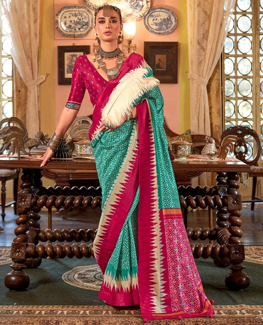 Green jaal patterned patola designer catalog saree, contrast temple border, and patola design pallu