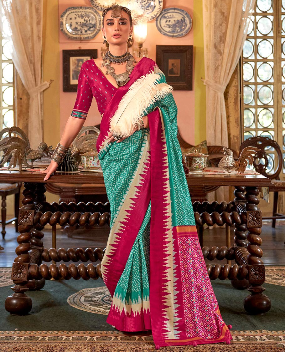 Green jaal patterned patola designer catalog saree, contrast temple border, and patola design pallu