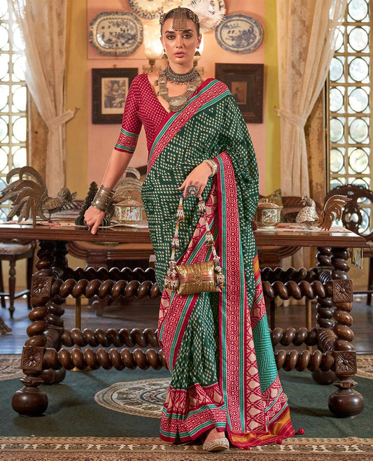 Green diamond patola designer catalog saree, contrast patola border, and intricately patola designed pallu