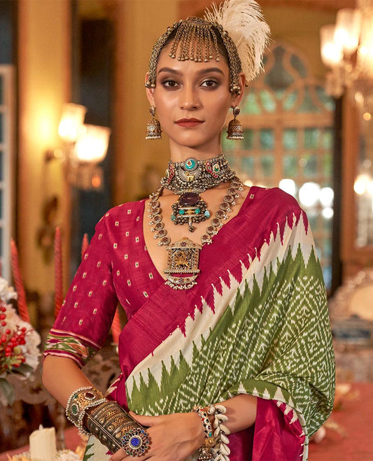 Light green  jaal patterned patola designer catalog saree, contrast temple border, and patola design pallu