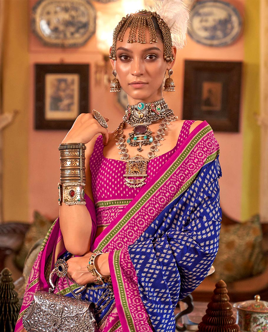 Royal blue diamond patola designer catalog saree, contrast patola border, and intricately patola designed pallu