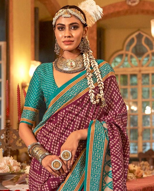 Wine diamond patola designer catalog saree, contrast patola border, and intricately patola designed pallu