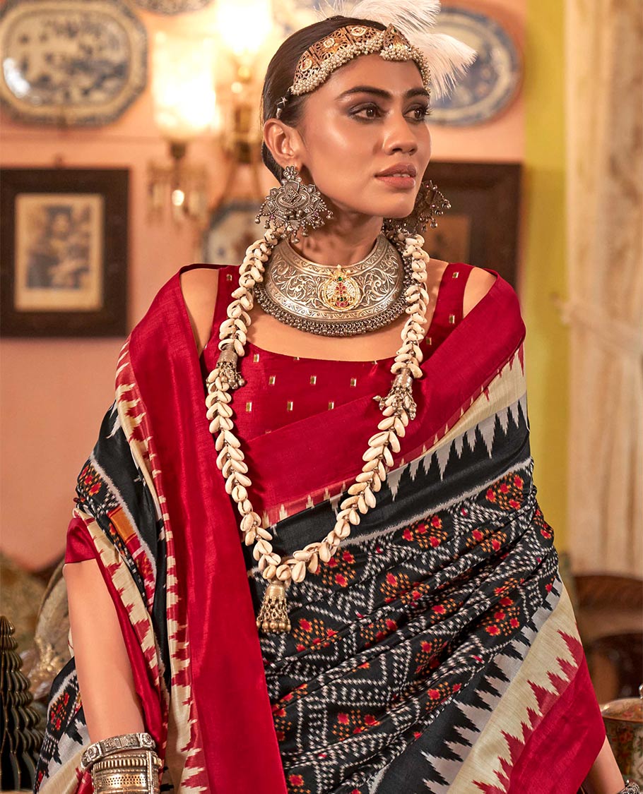 Black diamond patterned patola designer catalog saree, contrast temple border, and patola design pallu