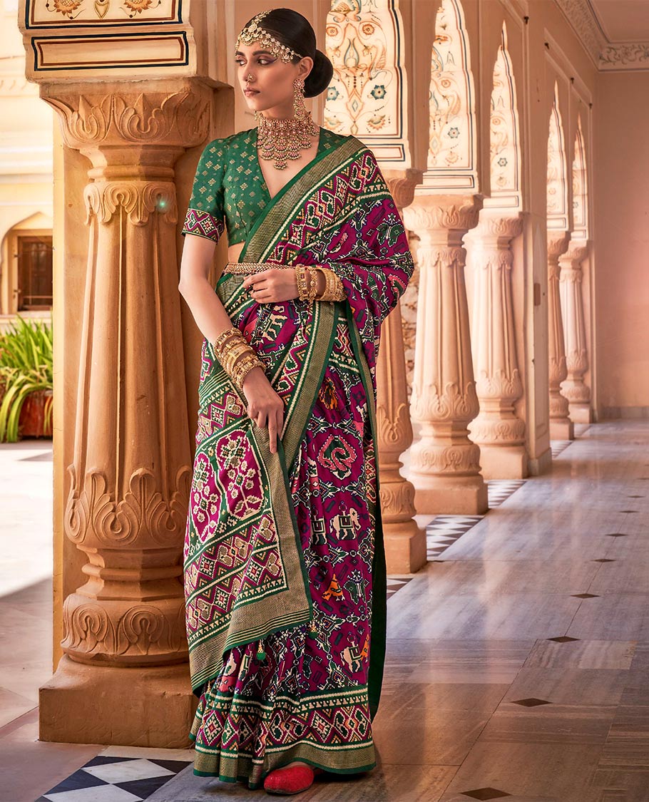 Purple buttas enclosed jaal patterned patola designer catalog saree, contrast border and pallu of patola designs