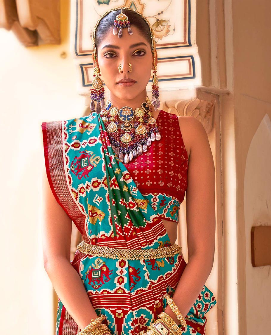 Green intricate patola patterned designer catalog saree, contrast border and pallu of patola designs