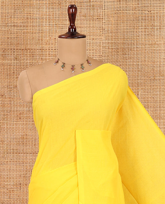 Borderless Yellow Plain Khadi Cotton Saree, a Self-Pallu with Tassels, and a Matching Blouse