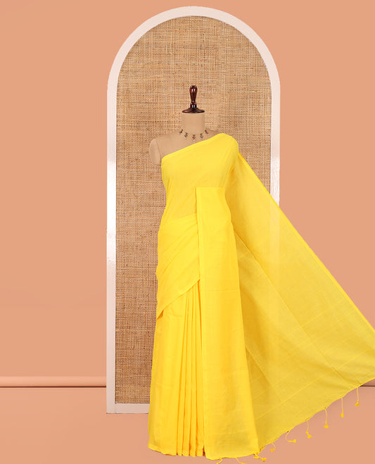 Borderless Yellow Plain Khadi Cotton Saree, a Self-Pallu with Tassels, and a Matching Blouse