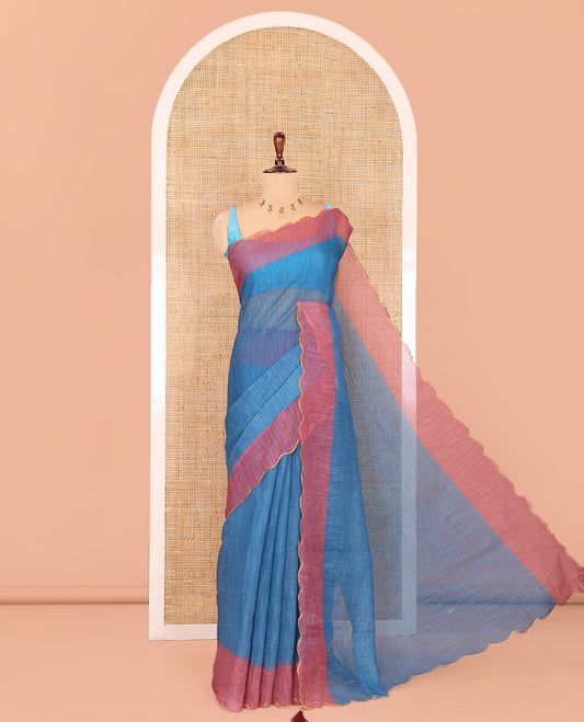 Dusky Blue Plain Linen Cotton Saree, Contrast Plain Scallop Border, a Self-Pallu, and Contrast Kalamkari Printed Blouse