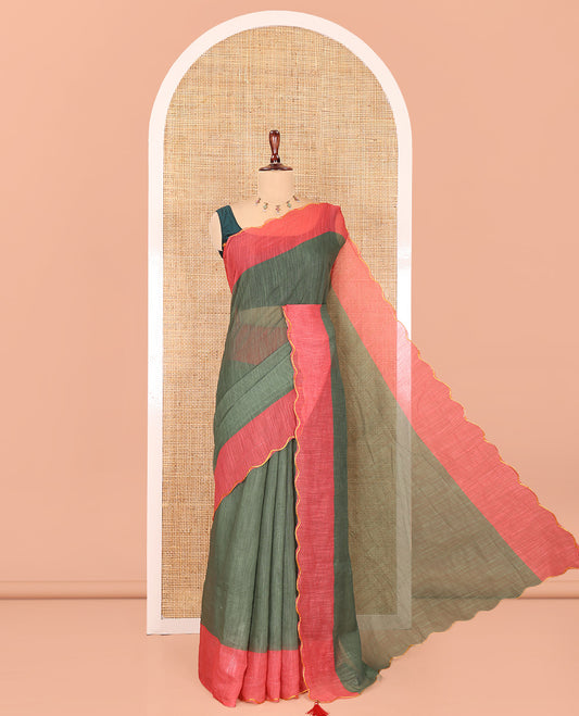 Green Plain Linen Cotton Saree, Contrast Plain Scallop Border, a Self-Pallu, and Contrast Kalamkari Printed Blouse