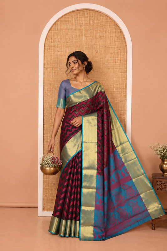 Black Semi-Organza Saree Features Pochampally Ikat Chevron Stripes, a Contrast Border, Paisley Pallu, and Contrast Blouse