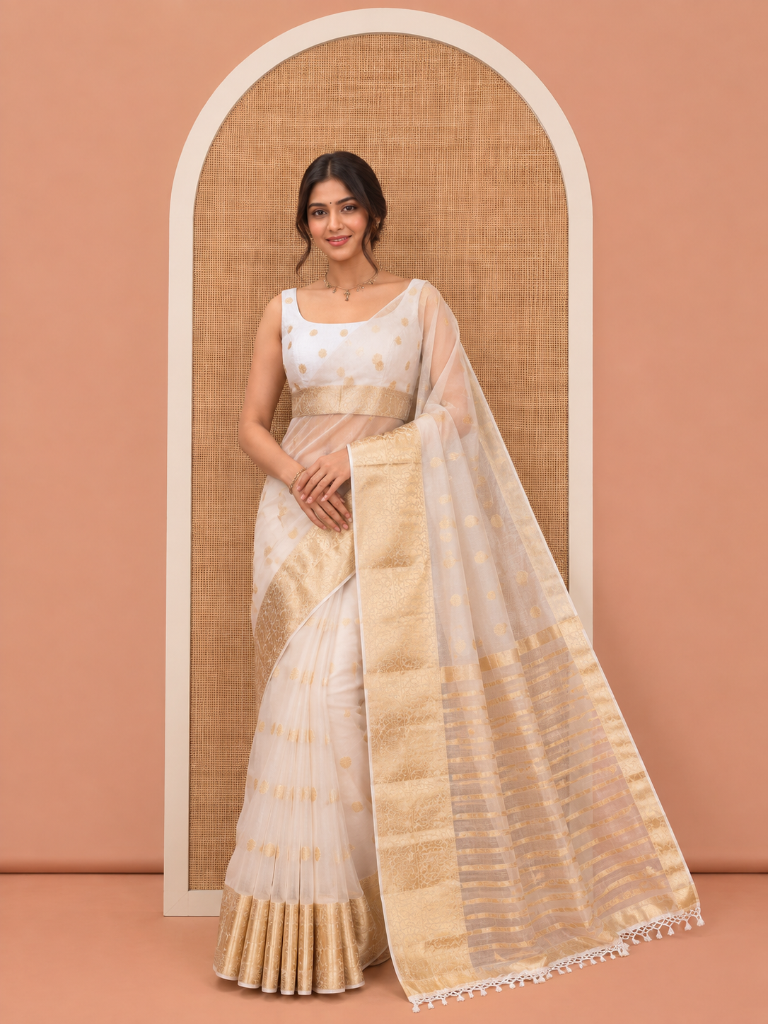 Cream Semi-Organza Saree, Steeped in Richness of Zari Buttas, Highlighted by a Zari Floral Creeper Border, and a Matching Blouse