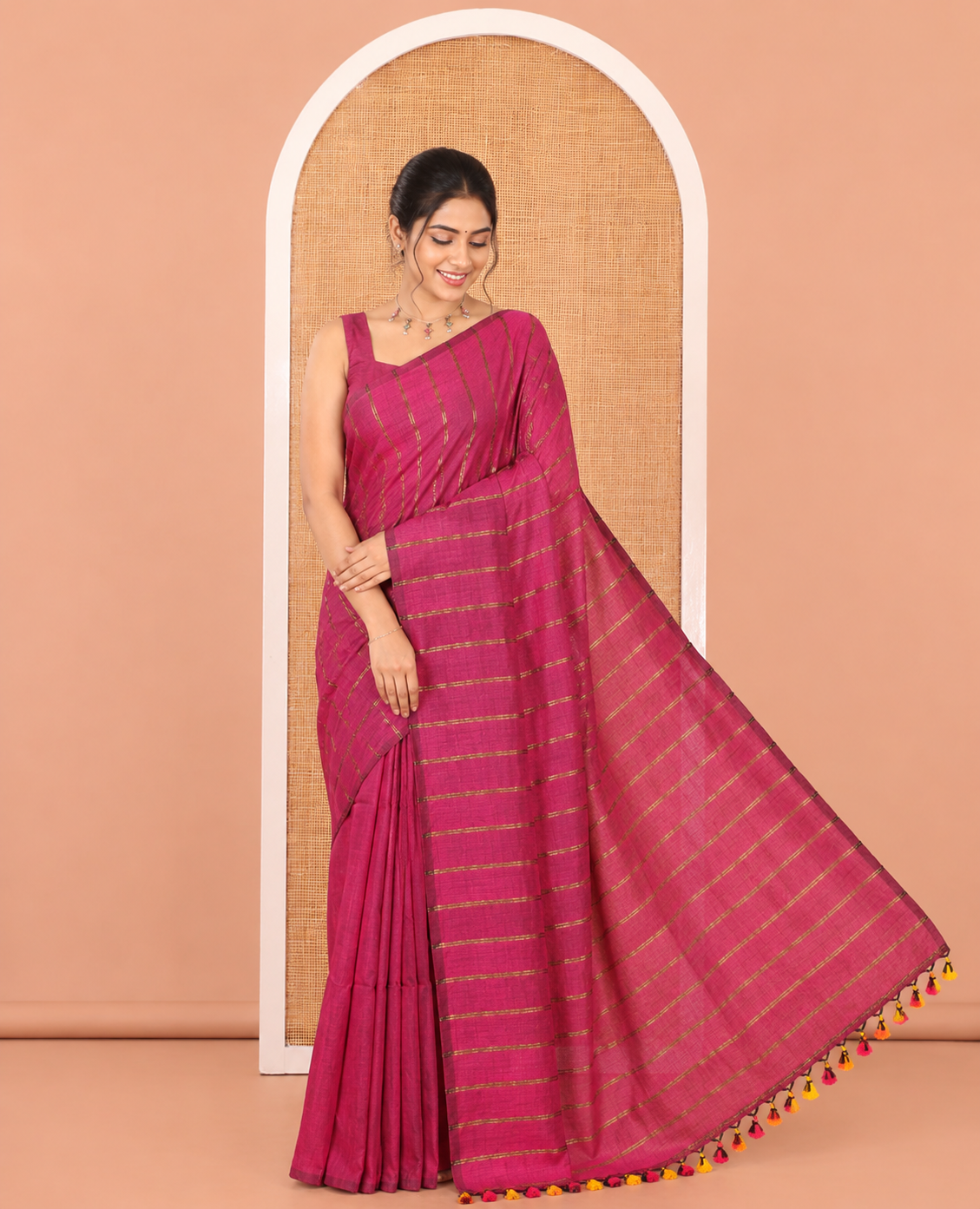 Borderless Magenta Khadi Cotton Saree Features Double Stripes, a Self-Pallu of Tassels, and a Matching Blouse