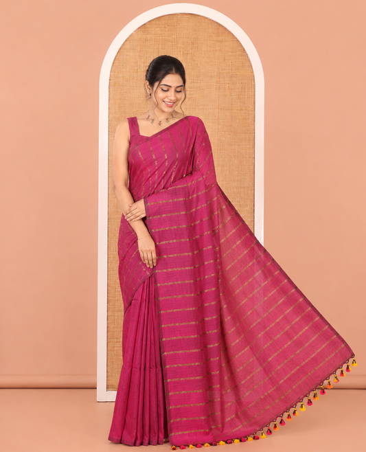 Borderless Magenta Khadi Cotton Saree Features Double Stripes, a Self-Pallu of Tassels, and a Matching Blouse
