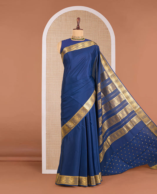 Navy blue plain Mysore silk saree, traditional zari border of two-headed eagle motifs in zari, and zari design pallu