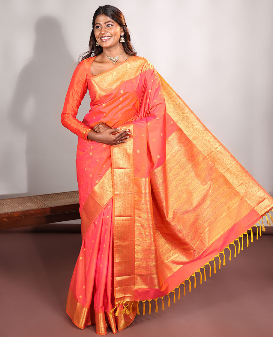 Orange Budget Silk Saree, Meticulously Woven with Zari Buttas on Its Body, Highlighted by a Traditional Zari Design Woven Border, Intricately Designed Pallu, and Paired with a Matching Blouse