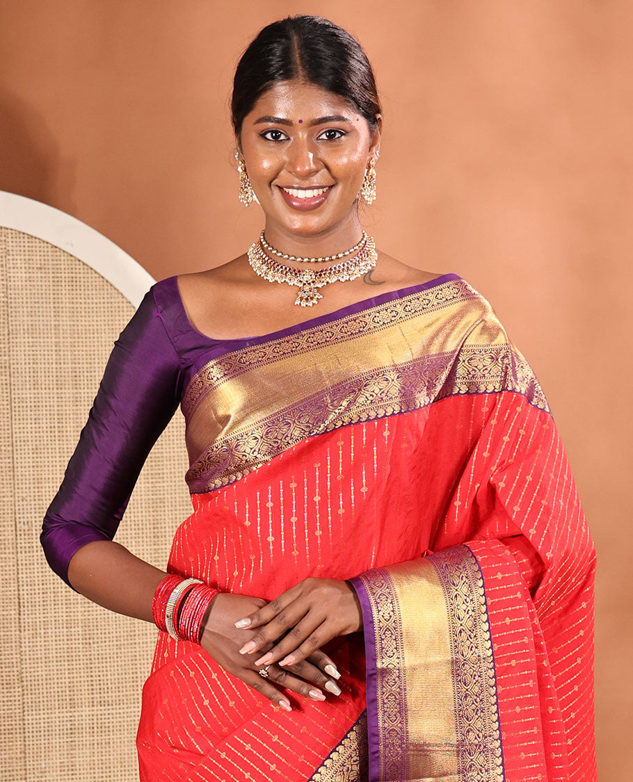 Red Budget Silk Saree, Embellished with Zari Stripes All Across Its Body, Complemented by Captivating Contrast Traditional Zari Designs Woven Border, Grandly Decked Up Jaal Patterned Pallu, and Paired with a Contrast Blouse