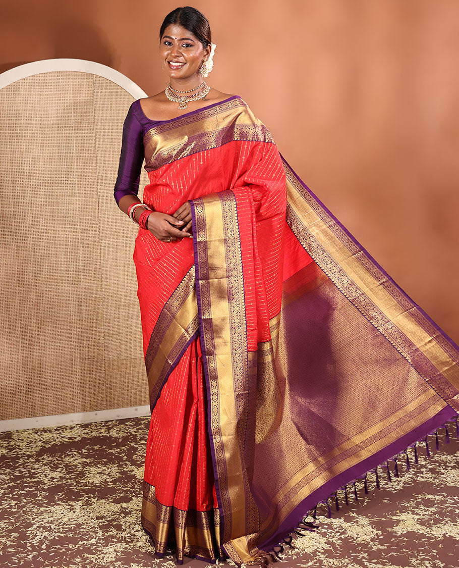 Red Budget Silk Saree, Embellished with Zari Stripes All Across Its Body, Complemented by Captivating Contrast Traditional Zari Designs Woven Border, Grandly Decked Up Jaal Patterned Pallu, and Paired with a Contrast Blouse