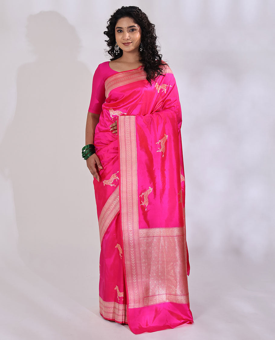 Pink Banarasi Silk Saree Accentuated with Zebra Motifs All Over Its Body, a Subtle Border of Traditional Designs, Pallu Decked Up with Floral and Diamond Designs, and Paired with a Matching Blouse