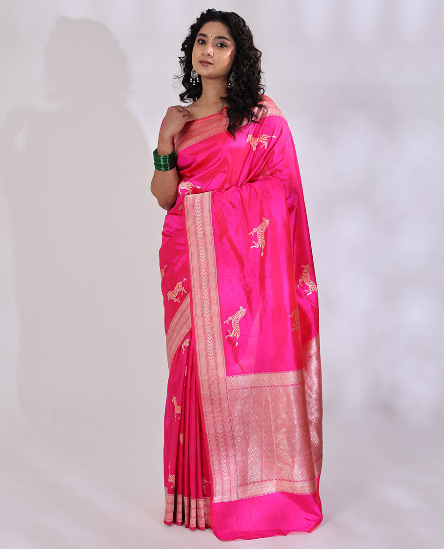 Pink Banarasi Silk Saree Accentuated with Zebra Motifs All Over Its Body, a Subtle Border of Traditional Designs, Pallu Decked Up with Floral and Diamond Designs, and Paired with a Matching Blouse