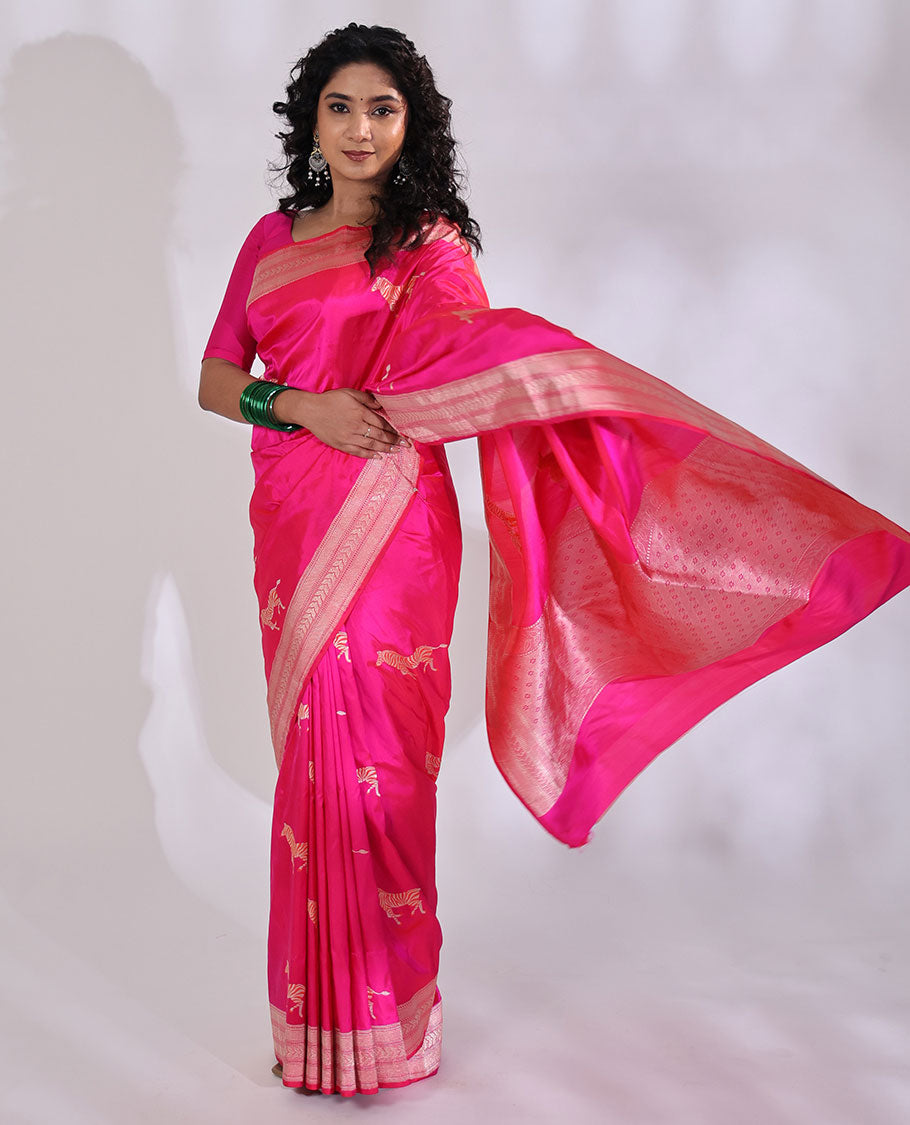 Pink Banarasi Silk Saree Accentuated with Zebra Motifs All Over Its Body, a Subtle Border of Traditional Designs, Pallu Decked Up with Floral and Diamond Designs, and Paired with a Matching Blouse