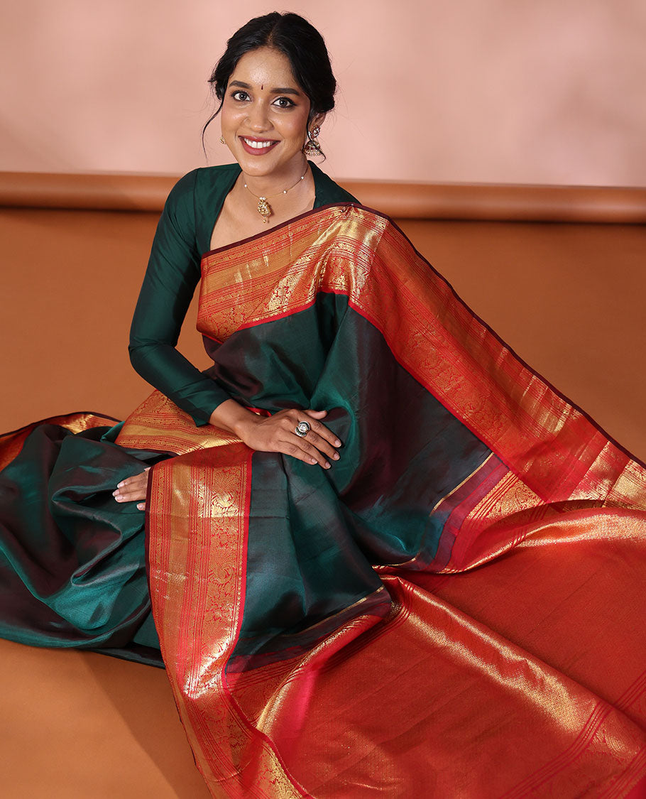 Green Plain Kanchipuram Soft Silk Saree, Complemented by a Contrast Korvai Border of Thilakam Mokku, Mayil, Muthu, Neli, and Mayil Kann Designs, Zari Elevated Jaal Pallu, and Paired with a Contrast Blouse