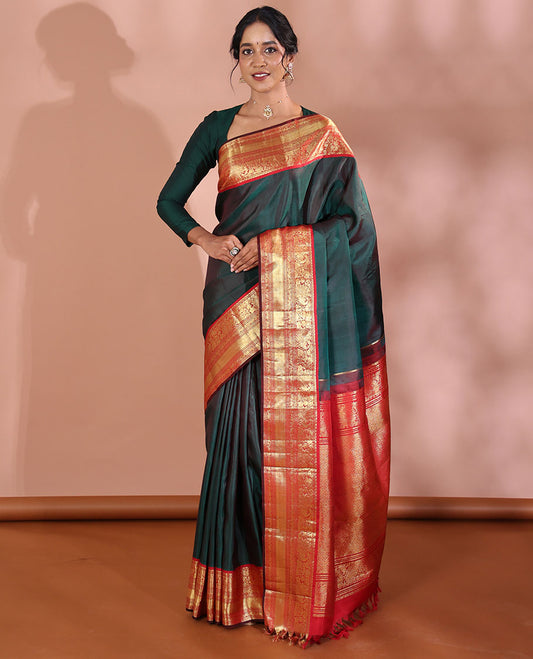 Green Plain Kanchipuram Soft Silk Saree, Complemented by a Contrast Korvai Border of Thilakam Mokku, Mayil, Muthu, Neli, and Mayil Kann Designs, Zari Elevated Jaal Pallu, and Paired with a Contrast Blouse