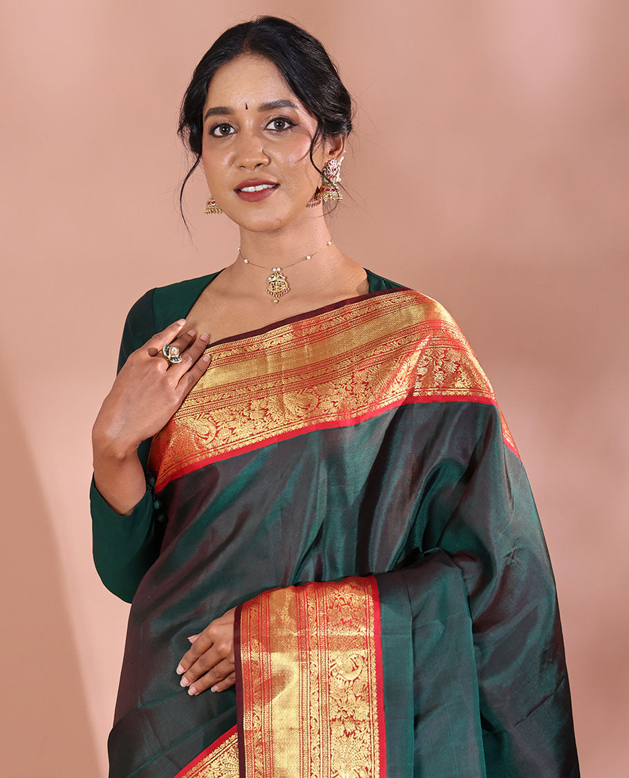Green Plain Kanchipuram Soft Silk Saree, Complemented by a Contrast Korvai Border of Thilakam Mokku, Mayil, Muthu, Neli, and Mayil Kann Designs, Zari Elevated Jaal Pallu, and Paired with a Contrast Blouse