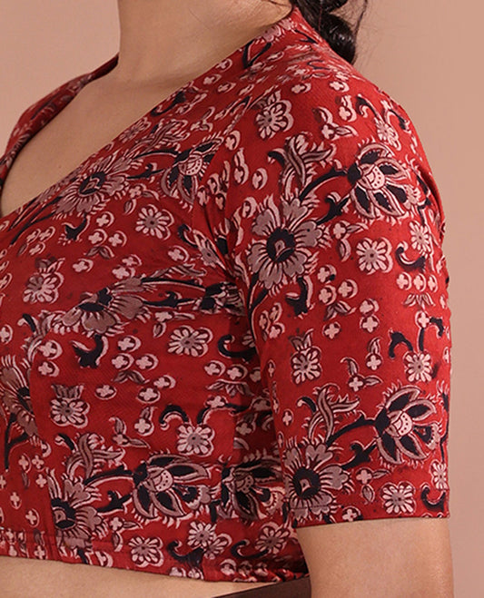 Red Readymade Blouse Prettified with Floral Motif Print, Featuring Front Leaf-Neck, Back Closed Neck, and Half-Sleeves